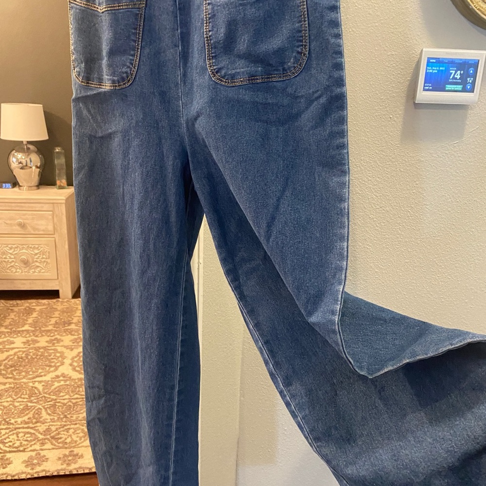 Bebe girls denim jumpsuit- zips up the back